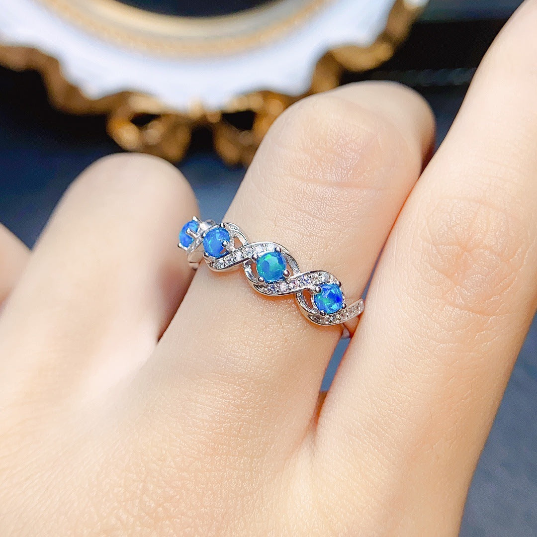 Elegant woman wearing S925 Silver Ring with Natural Blue Opal