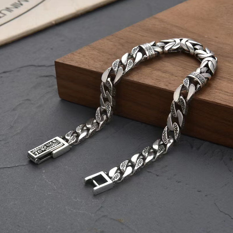 "Silver Bracelet for Men with Peace Symbol Detailing"