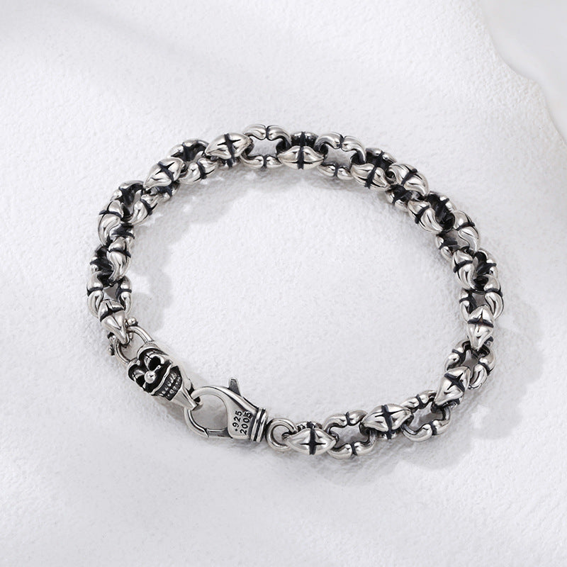 Detailed view of the S925 Silver and Thick Skull on the bracelet