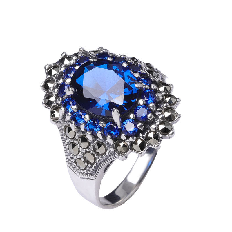 Women's Blue Corundum Silver Ring with Red Garnet