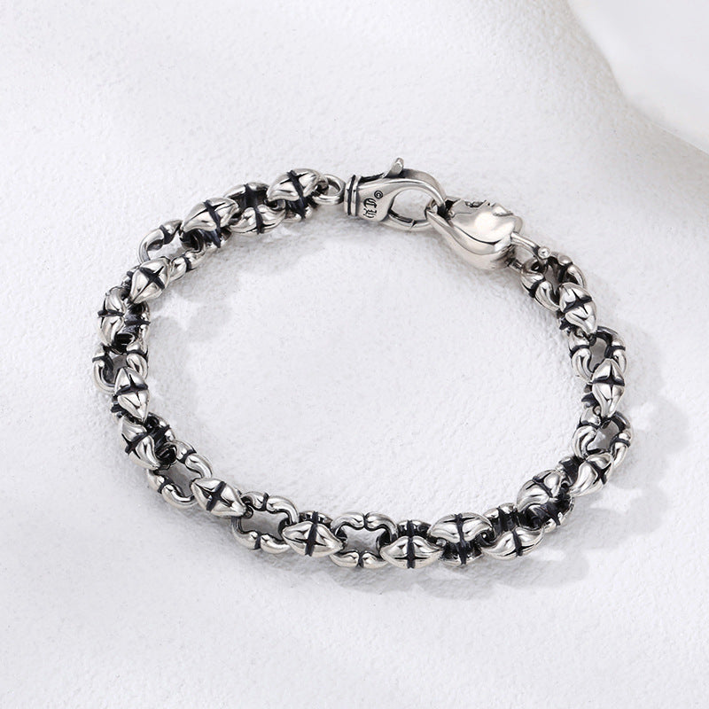 Shiny sterling silver bracelet with skull design