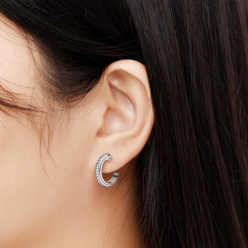 Close-up of Women's Moissanite Sterling Silver Hoop Earrings